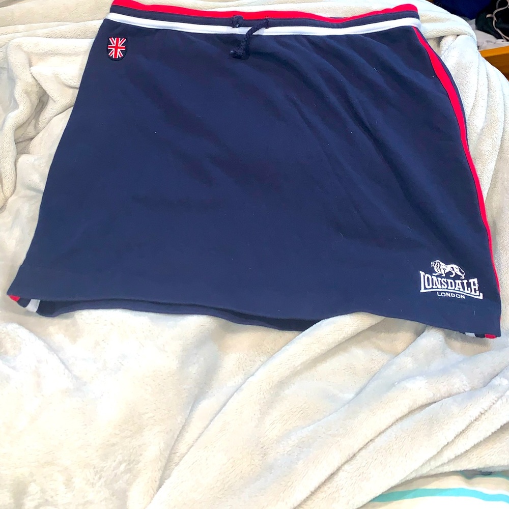 Vintage navy lonsdale London skirt with red and white trim
